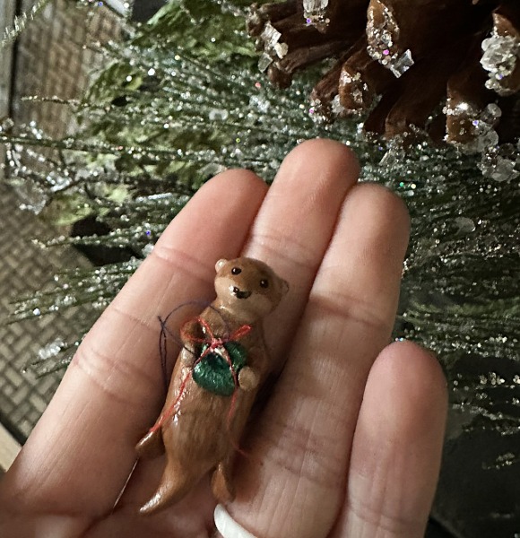 Otter with Gift